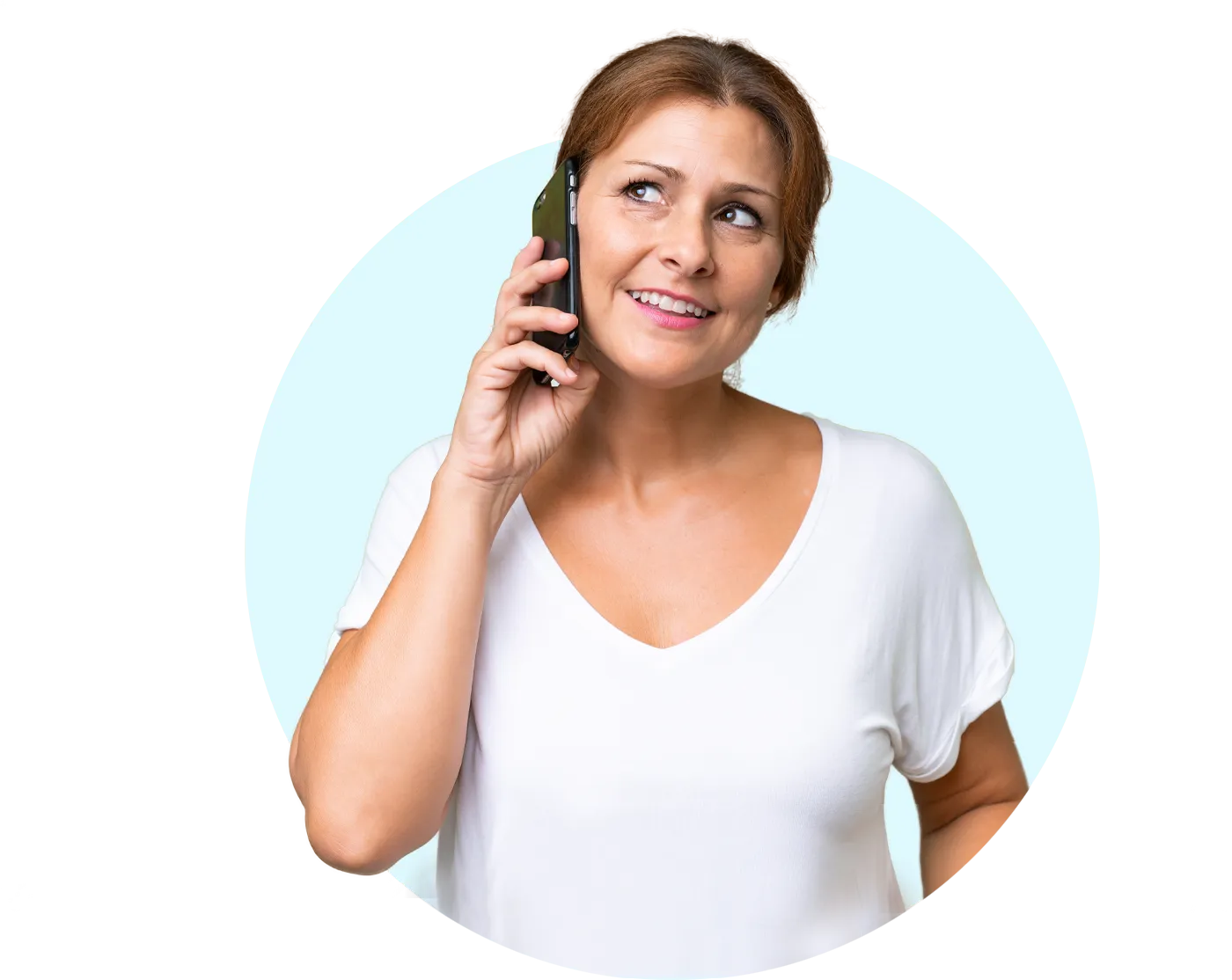 Woman on her phone who is listening to an On Hold message while waiting for a representative to answer the phone